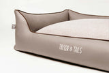 Quality memory foam dog bed, made from luxurious leather and woven fabric