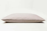 Dog bed pillow made from leather and woven fabric