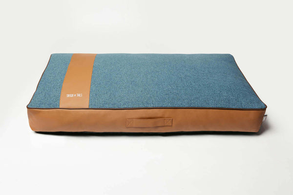 Medium blue and beige dog mattrass bed made from leather and woven fabric