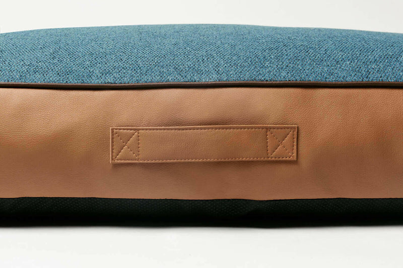 Blue and beige dog mattrass bed with handle